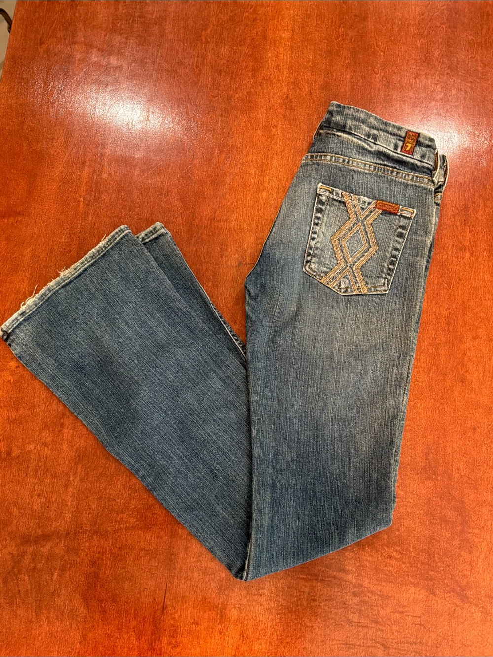 7 For All Mankind Distressed Medium Wash Bootcut Jeans with Embroidered Pockets